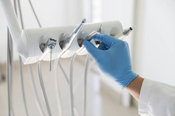 Professional Tooth Extraction technician working in Newark, TX
